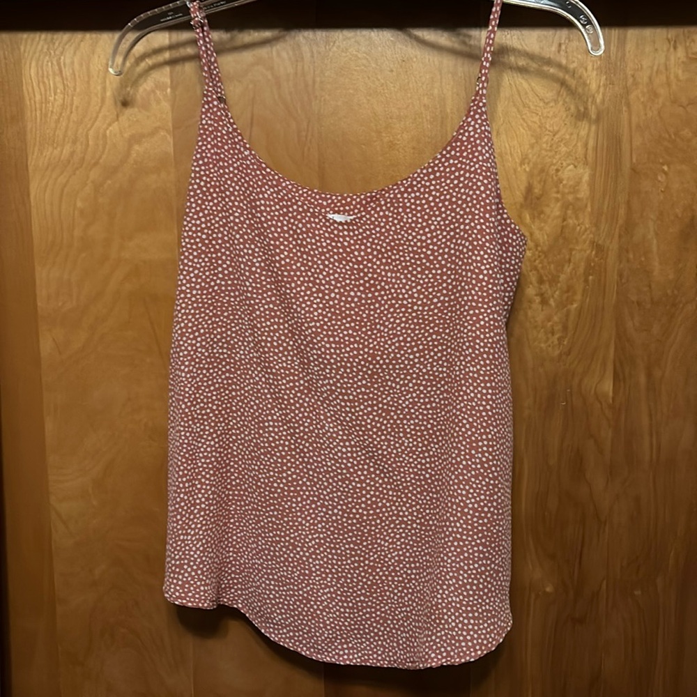 Pink tank top with white polka dots